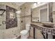 Elegant bathroom with marble tile and vessel sink at 13611 W Merrell St, Avondale, AZ 85392