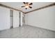 Bright bedroom with double door closet and marble floors at 13611 W Merrell St, Avondale, AZ 85392