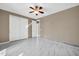 Bright bedroom with double door closet and marble floors at 13611 W Merrell St, Avondale, AZ 85392