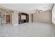 Living room with built-in entertainment center and marble floors at 13611 W Merrell St, Avondale, AZ 85392