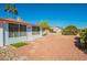 Backyard view with patio and landscaping at 14103 W Casa Linda Dr, Sun City West, AZ 85375