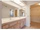 Bathroom boasts double sinks and ample storage at 14103 W Casa Linda Dr, Sun City West, AZ 85375