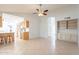 Kitchen nook with tile floor, built-in shelves, and view of kitchen at 14103 W Casa Linda Dr, Sun City West, AZ 85375