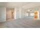 Spacious dining area with mirrored wall and ceiling fan at 14103 W Casa Linda Dr, Sun City West, AZ 85375