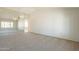 Neutral colored and empty bedroom is ready for you to furnish and make your own at 14103 W Casa Linda Dr, Sun City West, AZ 85375