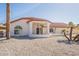 Bright white single story home with red tile roof and a covered entryway at 14103 W Casa Linda Dr, Sun City West, AZ 85375