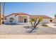 Front view of a single story home with gravel landscaping and a red tile roof at 14103 W Casa Linda Dr, Sun City West, AZ 85375