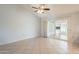 Gathering room with tile floors and access to a sunroom at 14103 W Casa Linda Dr, Sun City West, AZ 85375