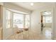 Cozy kitchen nook with built-in window seat and view at 14103 W Casa Linda Dr, Sun City West, AZ 85375