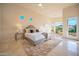 Bright main bedroom boasts neutral tones, recessed lighting, and a private entrance to the backyard at 15701 E Greystone Dr, Fountain Hills, AZ 85268