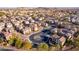 Aerial view of a community featuring numerous houses and a central courtyard at 15913 S 11Th Way, Phoenix, AZ 85048