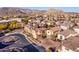 Aerial view of a house and surrounding neighborhood with mountain backdrop at 15913 S 11Th Way, Phoenix, AZ 85048