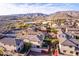 Aerial view of houses and neighborhood with mountain backdrop at 15913 S 11Th Way, Phoenix, AZ 85048