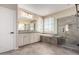 Elegant bathroom featuring double vanity, soaking tub and shower at 15913 S 11Th Way, Phoenix, AZ 85048