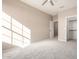 Bright bedroom featuring a window and closet at 15913 S 11Th Way, Phoenix, AZ 85048