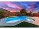 Relaxing pool area with artificial turf at 1625 W Cool Water Way, San Tan Valley, AZ 85144