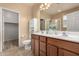 Large bathroom with double sinks and a walk-in shower at 1625 W Cool Water Way, San Tan Valley, AZ 85144