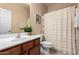 Clean bathroom with shower/tub combo, vanity, and toilet at 1625 W Cool Water Way, San Tan Valley, AZ 85144