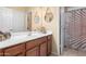 Bathroom with updated vanity and shower at 1625 W Cool Water Way, San Tan Valley, AZ 85144