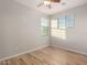 Bright bedroom with wood floors and ceiling fan at 1625 W Cool Water Way, San Tan Valley, AZ 85144