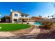 Two story home with a backyard pool and putting green at 16414 N 48Th Way, Scottsdale, AZ 85254