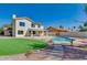 Beautiful backyard oasis with a sparkling pool and artificial turf at 16414 N 48Th Way, Scottsdale, AZ 85254