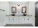 Modern bathroom with double vanity and black sinks at 16414 N 48Th Way, Scottsdale, AZ 85254