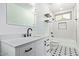 Modern bathroom with white vanity, subway tile, and patterned floor at 16414 N 48Th Way, Scottsdale, AZ 85254