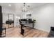 Bright home office features a large desk, hardwood floors, and mirrored closet at 16414 N 48Th Way, Scottsdale, AZ 85254