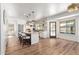 Modern kitchen with white cabinets, large island, and stainless steel appliances at 16414 N 48Th Way, Scottsdale, AZ 85254