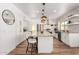 Modern kitchen with granite countertops, stainless steel appliances, and white cabinets at 16414 N 48Th Way, Scottsdale, AZ 85254