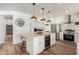 Modern kitchen with granite island and stainless steel appliances at 16414 N 48Th Way, Scottsdale, AZ 85254