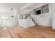 Bright living room with hardwood floors and modern staircase at 16414 N 48Th Way, Scottsdale, AZ 85254