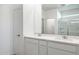 Modern bathroom with double vanity and quartz countertop at 17741 W Mission Ln, Waddell, AZ 85355