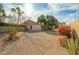 Landscaped backyard with gravel, cacti, and desert plants at 18449 N 46Th Ave, Glendale, AZ 85308