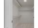 Large walk-in closet with double hanging rods and a shelf at 18449 N 46Th Ave, Glendale, AZ 85308