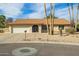 House exterior showcasing a two-car garage and desert landscaping at 18449 N 46Th Ave, Glendale, AZ 85308