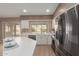 Modern kitchen with stainless steel appliances and a kitchen island at 18449 N 46Th Ave, Glendale, AZ 85308