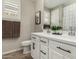 Clean bathroom with double vanity and modern fixtures at 18610 W Alice Ave, Waddell, AZ 85355