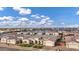 Expansive aerial view showcasing this single-story home within a thriving residential neighborhood at 20456 E Camina Buena Vis, Queen Creek, AZ 85142