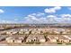 Overhead aerial view showcasing this home within a community including backyard with swimming pool at 20456 E Camina Buena Vis, Queen Creek, AZ 85142