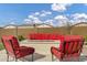 Backyard area with gas fire pit, and outdoor seating at 20456 E Camina Buena Vis, Queen Creek, AZ 85142