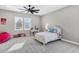 Bedroom featuring white trundle bed, desk, and plush beanbag at 20456 E Camina Buena Vis, Queen Creek, AZ 85142