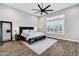 Bedroom featuring hard wood flooring, and a window with blinds at 20456 E Camina Buena Vis, Queen Creek, AZ 85142