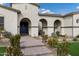 Inviting front entrance featuring a set of columns and a stone walkway and planters at 20456 E Camina Buena Vis, Queen Creek, AZ 85142