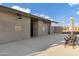 Pool restrooms featuring a block wall exterior with dark lighting fixtures at 20456 E Camina Buena Vis, Queen Creek, AZ 85142