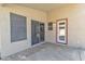 Patio with sliding glass door and exterior door access at 20902 N 36Th Pl, Phoenix, AZ 85050