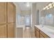 Double sink bathroom with shower and backyard access at 20902 N 36Th Pl, Phoenix, AZ 85050