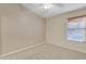 Bright bedroom with a window and ceiling fan at 20902 N 36Th Pl, Phoenix, AZ 85050