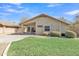 Side view of house with grassy yard and gravel landscaping at 20902 N 36Th Pl, Phoenix, AZ 85050